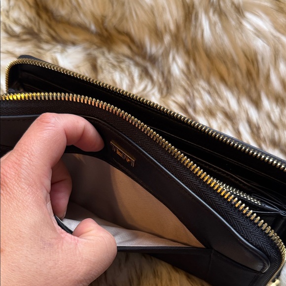 Tumi Black Leather Clutch with Gold Detail - Picture 9 of 10